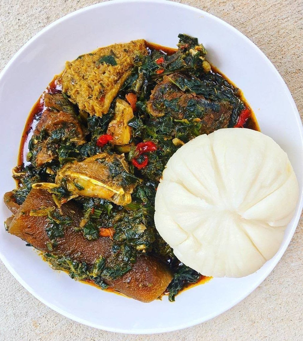Afang soup with pounded yam — Nigerian delicacy